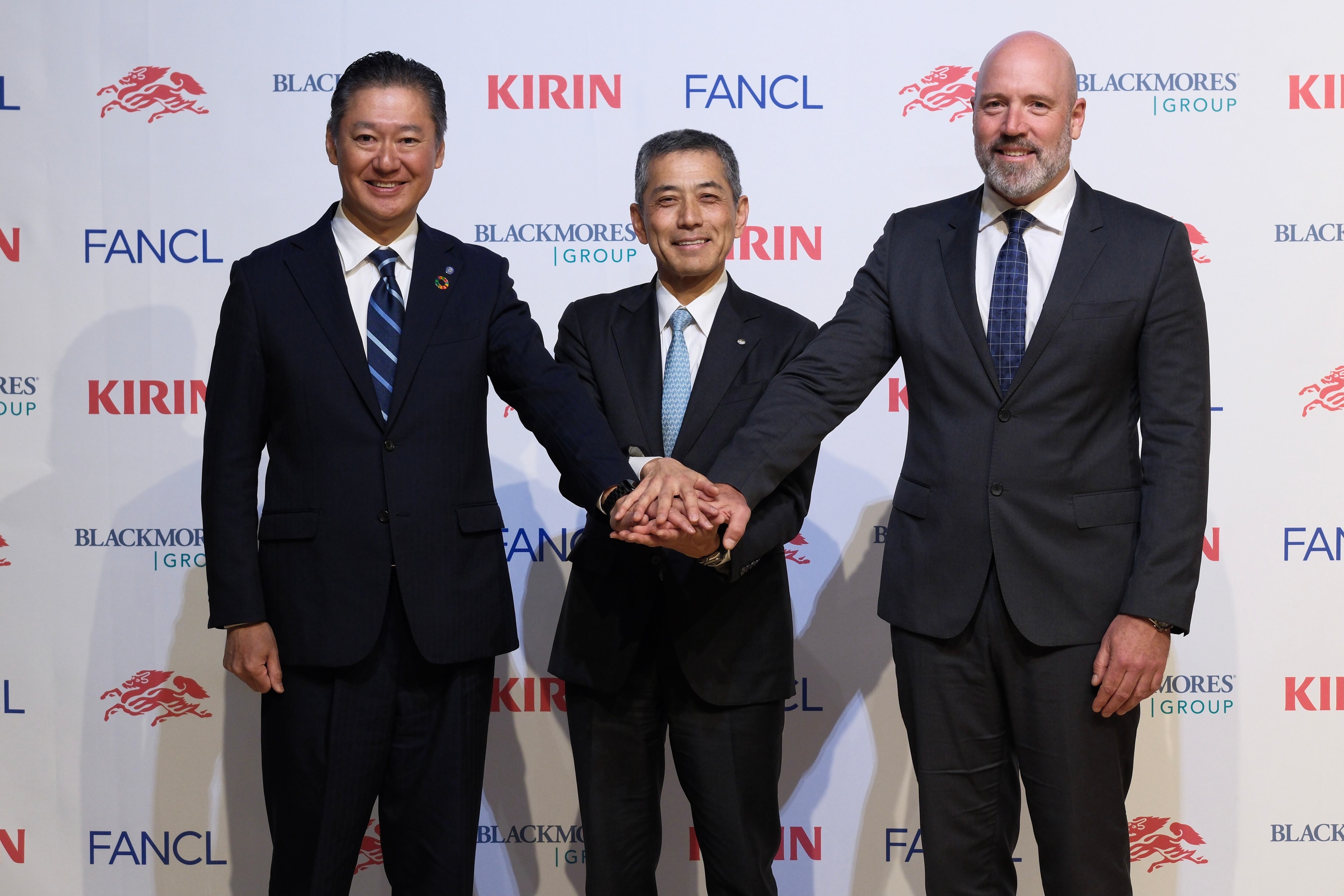 Hideki Mitsuhashi, president and representative director of FANCL Corporation (from left), Toru Yoshimura, director of the board, senior executive officer, president of Health Science Business Division at Kirin Holdings, and Alastair Symington, CEO and managing director of Blackmores Limited.
