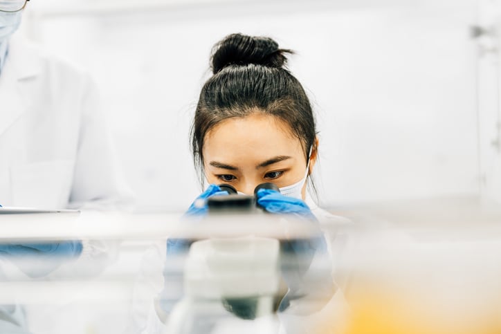 A woman scientist conducting laboratory research.