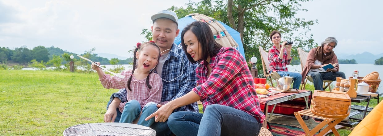 Happy family having picnic