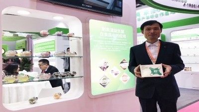 Chris Yu, general manager of Thankcome, showcasing the company's solid beverage product that contains the heat-stable probiotics BC-01. 