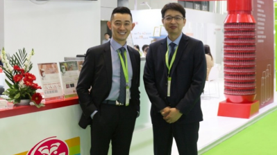 Grape King Bio's chairman Dr Andrew Tseng (left) and executive director of the R&D division Dr Hsu Sheng-Chieh at the exhibition. ©Grape King Bio