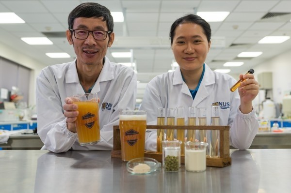Cheers: Associate Professor Liu Shao Quan and Chan Mei Zhi Alcine.