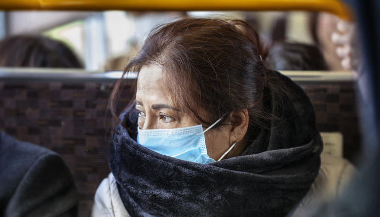 A Chinese woman wearing mask. ©Getty Images 